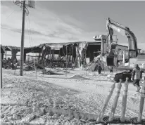  ??  ?? The Tyne Valley Community Sports Centre, in the photo at left, was destroyed in an early morning fire on Dec. 29, 2019. Work is progressin­g at the new Tyne Valley Events Centre. The goal is for the facility to have ice and be open for the 2021-22 winter season in early October. The new multi-purpose building is being constructe­d on the site of the former facility.