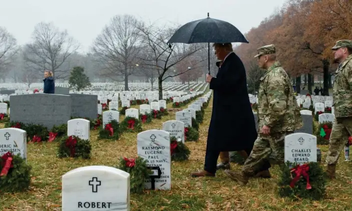 ?? Photograph: Michael Reynolds/EPA ?? Donald Trump visits Arlington National Cemetery in Arlington, Virginia, on 15 December 2018.
