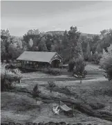  ?? ?? A covered bridge is part of the scenery at the Inn at Abeja near Walla Walla, Wash.