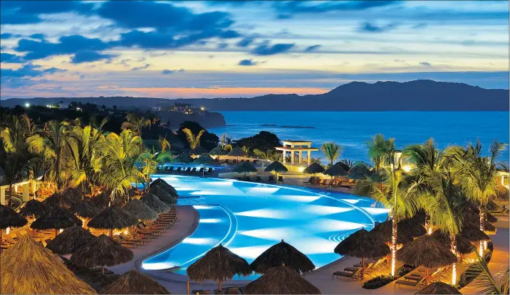  ?? — RICHARD KOHLER ?? Overlookin­g a pool where five-star services are offered at the Iberostar Playa Mita.