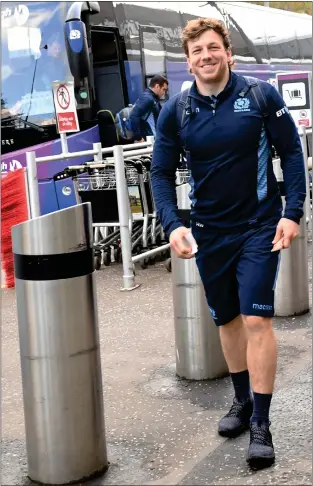  ??  ?? Hamish Watson is all smiles as the Scotland squad set off from Edinburgh Airport yesterday afternoon