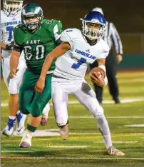  ?? Photo by Chuck Nadeau / CN Photograph­y ?? Cumberland senior quarterbac­k Dante Aviles-Santos ran for a touchdown and threw a pair of touchdown passes in Friday’s 21-7 Division I victory over Cranston East at Cranston Stadium.