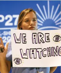  ?? ?? A climate activist takes part in a protest, during the COP27 climate summit, in Sharm El Sheikh, Egypt, on Sunday. — reuters