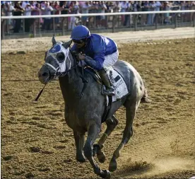  ?? SETH WENIG — THE ASSOCIATED PRESS ?? Essential Quality (2), with jockey Luis Saez up, crosses the finish line to win the 153rd running of the Belmont Stakes horse race, Saturday, June 5, 2021, at Belmont Park in Elmont, N.Y.