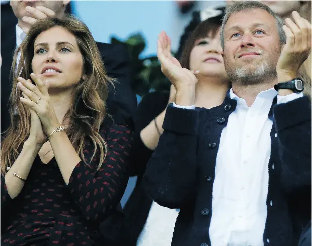  ?? MATT DUNHAM / THE ASSOCIATED PRESS FILES ?? Roman Abramovich and his third wife Dasha Zhukova at the Champions League final between Bayern Munich and his Chelsea team in 2012.