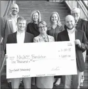  ?? Courtesy photo ?? Caddell Constructi­on Co. presented a $1,000 check on Jan. 22 to Northwest Arkansas Community College for the Joyce Caddell Scholarshi­p. The scholarshi­p is given to a female student studying in the college’s constructi­on technology program. Shown are...