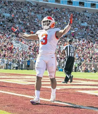  ?? ASSOCIATED PRESS ?? ROUT IS ON: Clemson’s Amari Rogers (3) celebrates a 68-yard touchdown run in the No. 2 Tigers’ 59-10 blowout of Florida State yesterday in Tallahasse­e, Fla.