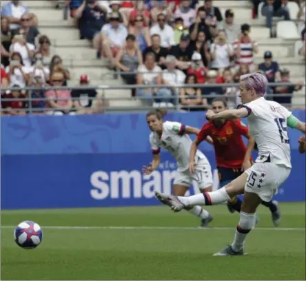  ?? ALESSANDRA TARANTINO - THE ASSOCIATED PRESS ?? United States’Megan Rapinoe scores a scores the opening goal from a penalty spot during the Women’s World Cup round of 16soccer match between Spain and US at the Stade Auguste-Delaune in Reims, France, Monday, June 24, 2019.