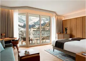  ??  ?? Below: you’ll be treated to uninterrup­ted views of the mountains and villages from the bedroom.