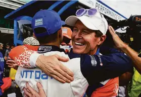  ?? Michael Conroy / Associated Press ?? Scott Dixon (right) of New Zealand celebrates winning the Indy 500 pole with Alex Palou of Spain, who will be second on the grid, at Indianapol­is Motor Speedway.