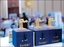  ??  ?? Left: Fashion and jewelry displays will be a highlight at the consumer goods exhibition area during the 2021 CIIE.