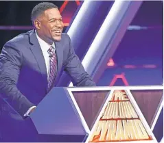 ?? LOU ROCCO, ABC ?? Michael Strahan is back to host a star- filled second season of the game- show classic The $ 100,000 Pyramid.