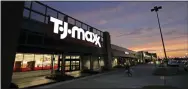  ?? GERALD HERBERT — THE ASSOCIATED PRESS ?? Shoppers enter a T.J. Maxx in Harahan, La.