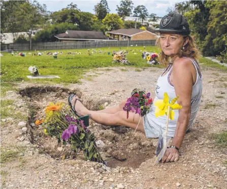  ?? Picture: JERAD WILLIAMS ?? Susan Kelly at the grave of her 18-year-old son Haydn Kelly, below, at Mudgeeraba cemetery.