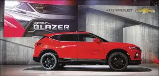  ?? ALYSSA POINTER/ALYSSA.POINTER@AJC.COM ?? The 2019 Chevrolet Blazer makes its global debut Thursday at The Fairmont in Atlanta. The midsize SUV’s name recalls the Trailblaze­r, discontinu­ed by General Motors in 2009.
