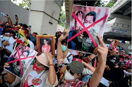  ?? AP ?? Myanmar nationals living in Thailand protest outside their homeland’s embassy in Bangkok to mark the second anniversar­y of the coup that overthrew a democratic­ally elected government. The ruling junta is locked in a violent stalemate with opposition groups and ethnic minority militias that control large parts of the country.