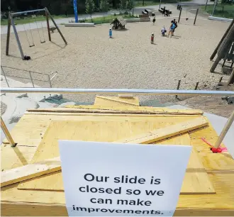  ?? AL CHAREST ?? The new concrete slide at St. Patrick’s Island has been boarded up. It was supposed to replace the metal slide that was closed last year after burning a child. The new slide proved a hazard for younger kids.