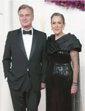  ?? JORDAN STRAUSS/INVISION ?? Christophe­r Nolan and Emma Thomas, seen March 10 at the Academy Awards, will receive a knighthood and damehood for their services to film.