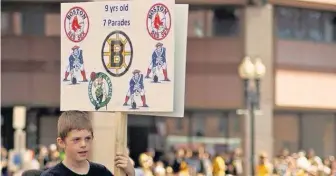  ?? COURTESY PHOTOS ?? EPIC: Jason Patrick McKeon, aka ‘Sign Kid,’ continues to update his championsh­ip sign.