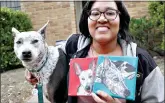  ?? (AP Photo/LM Otero) ?? Danielle Moore poses for photos with Kana and also paintings of the pet Australian cattle dog March 2, 2020, in Dallas. In the dog-eat-dog world of online shopping, Chewy has an unusual plan to fend off Amazon: turning pets into works of art. The online pet shop surprises customers with oil paintings of their furry friends, a move the company says wins them customers for life.