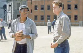  ?? WARNER HOME VIDEO ?? Morgan Freeman, left, and Tim Robbins form a classic inmate partnershi­p in 1994’s “The Shawshank Redemption.”