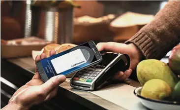  ??  ?? Digital pay: MobilePay, Danske’s digital-pay subsidiary, is urging Nordic banks to form a single payments platform to fend off global challenger­s like Apply Pay and Samsung Pay, seen here.
