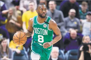  ?? Andy Lyons / Getty Images ?? Kemba Walker of the Boston Celtics dribbles the ball against the Indiana Pacers back in March.
