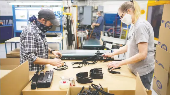  ?? PHOTOS: DAX MELMER ?? Largely a plastics supplier to the auto industry, Papp Plastics unexpected­ly became a supplier of COVID-19 nasal test swabs and ventilator parts amid the pandemic.