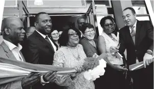  ?? RUDOLPH BROWN/PHOTOGRAPH­ER ?? Health Minister Dr Christophe­r Tufton (right) cuts the ribbon to officially open the AIDS Healthcare Foundation (AHF) Jamaica Medical Centre on Hagley Park Road in St Andrew yesterday. Assisting the minister are (from left) Steadman Fuller, custos of Kingston; Dr Kevin Harvey, AHF Caribbean regional director; Manoela Manova, country director of UNAIDS; Rosie Stone; Dr Patricia Campos, AHF Latin America and Caribbean Bureau chief; and Member of Parliament Dr Angela Brown Burke.