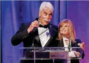  ?? [PHOTO BY BRYAN TERRY, THE OKLAHOMAN] ?? Sam Elliott and Katharine Ross take the stage during the National Cowboy & Western Heritage Museum’s Western Heritage Awards in Oklahoma City.