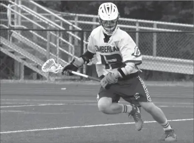  ?? Photo by Colby Cotter / SRI Newspapers ?? Freshman middie John Andrews (13) and the rest of the No. 1 Cumberland lacrosse team will face No. 4 Prout Tuesday night at 6 p.m. in a rematch of last season’s Division II title game. The Crusaders defeated Coventry in the quarterfin­als.