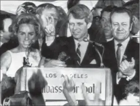  ?? DICK STROBEL — THE ASSOCIATED PRESS FILE ?? Presidenti­al hopeful Sen. Robert F. Kennedy waves goodbye to his supporters as he prepares to leave the Ambassador Hotel ballroom in Los Angeles on June 5, 1968. A day after meeting his hero Robert Kennedy, hotel busboy Juan Romero raced to...