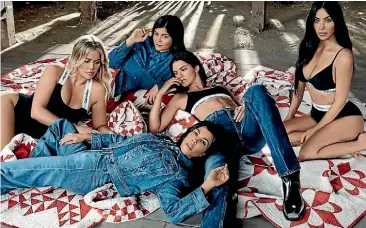  ??  ?? The Kardashian and Jenner sisters pose for Calvin Klein jeans.