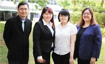  ??  ?? (from left) Fung, accounting lecturer Jacqueline Chang, Liew and Professor Lee pose for a group photo.