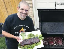  ?? TONY CALDWELL FILES ?? John Thomson, president of the Canadian BBQ Society says “barbecue sauce runs in his blood.”
