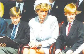  ??  ?? A file photo of Princess Diana with her sons Prince William and Prince Harry. (AFP)