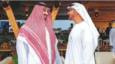  ??  ?? Shaikh Mohammad and Prince Mohammad Bin Salman attend the Formula E championsh­ip race at the historical Saudi city of Diriyah yesterday. WAM