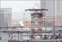  ?? MSG Entertainm­ent ?? A 170-ton steel compressio­n ring is lifted into place at the MSG Sphere at The Venetian. It will serve as the apex of the steel frame.