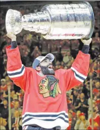  ?? AP PHOTO ?? Johnny Oduya celebrates after defeating the Tampa Bay Lightning in Game 6 of the NHL hockey Stanley Cup Final series.