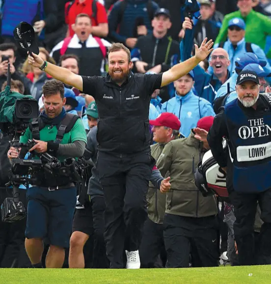  ??  ?? A six-shot cushion allowed Lowry to really savour the walk up 18