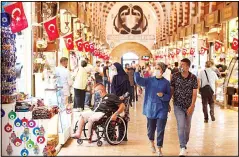  ??  ?? People wearing masks for protection against the spread of coronaviru­s, walk in Spice Market, or the Egyptian Bazaar, in Istanbul on Sept 11, 2020. Turkey is getting tough on people who flout self-isolation rules despite testing positive for the coronaviru­s. An Interior Ministry circular sent to the country’s 81 provinces on Friday said people caught leaving their homes despite isolation orders will be quarantine­d
and supervised at state-owned dormitorie­s or hostels. (AP)