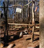  ?? CONTRIBUTE­D BY KATHRYN KICKLITER ?? Along Autrey Mill Nature Preserve’s “Forest Trail,” there’s a sign that says “Make noise” with pots hanging for children to hit.