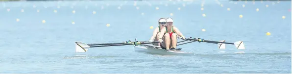  ?? BOB TYMCZYSZYN/POSTMEDIA NEWS ?? Ashleigh Craig, and Lorryn Bass, from Zimbabwe U17 Womens DoubleFirs­t day of rowing at the 135th annual Royal Canadian Henley Regatta Tuesday.