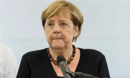  ?? Photograph: Thomas Lohnes/Getty Images ?? Critics have accused Angela Merkel of promoting her own country’s interests while failing to address wider issues such as climate change.