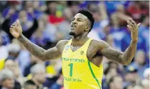  ?? JAMIE SQUIRE/GETTY IMAGES ?? Oregon’s Jordan Bell had 16 points and 13 rebounds in Oregon’s 69-68 win over the Michigan Wolverines on Thursday.