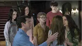  ?? STEVE DIETL / NETFLIX ?? The Crain family encounters several terrifying moments in “The Haunting of Hill House” on Netflix.