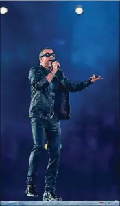  ?? HANNAH PETERS / GETTY IMAGES ?? Singer George Michael passed away on Christmas Day last year at age 53. Michael’s tribute performanc­e of Freddy Mercury’s “Somebody to Love” is arguably the peak and emotional centerpiec­e of the documentar­y “George Michael: Freedom,” which is available...