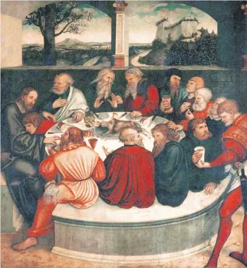  ?? FOTO: DPA ?? Der Reformatio­nsaltar der Pfarrkirch­e St. Marien in Wittenberg, wurde von Cranach d. Ä. begonnen, von seinem Sohn fertiggest­ellt und vermutlich 1547 errichtet, ein Jahr nach Luthers Tod. Die Mitteltafe­l zeigt das letzte Abendmahl. Luther speist mit,...