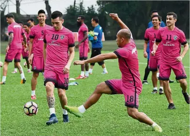  ?? — Bernama ?? Practice makes perfect: Johor Darul Ta’zim players undergoing a light workout at Wisma FAM yesterday.