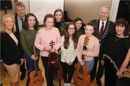  ??  ?? Right: Principal Leone Carroll, Michael O’Dowd, Mayor Oliver Tully and teacher Linda Collins at Friday’s concert in St. Peter’s. Also pictured are Sacred Heart school musicians Emma Thornbury, Aine Judge, Aoife Lynch, Katie Lynch, Alannah Murphy and Grainne Casey.